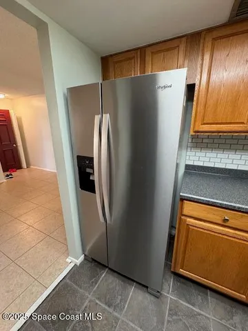 a kitchen with a stove and a microwave