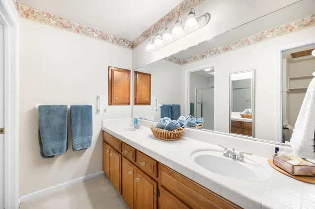 a bathroom with a shower and a toilet