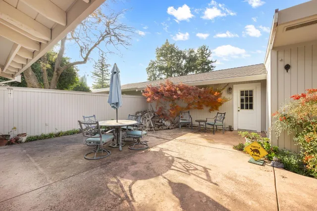 a bathroom with a sink mirror and vanity