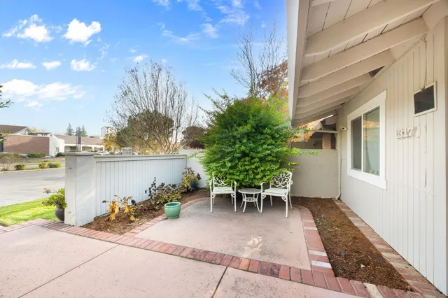 a view of a pathway with a yard