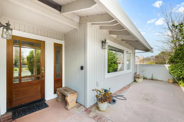 a hallway with dining room and livingroom view