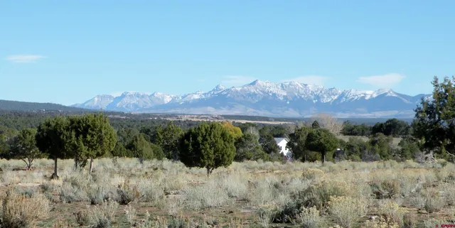 a view of lake with mountain