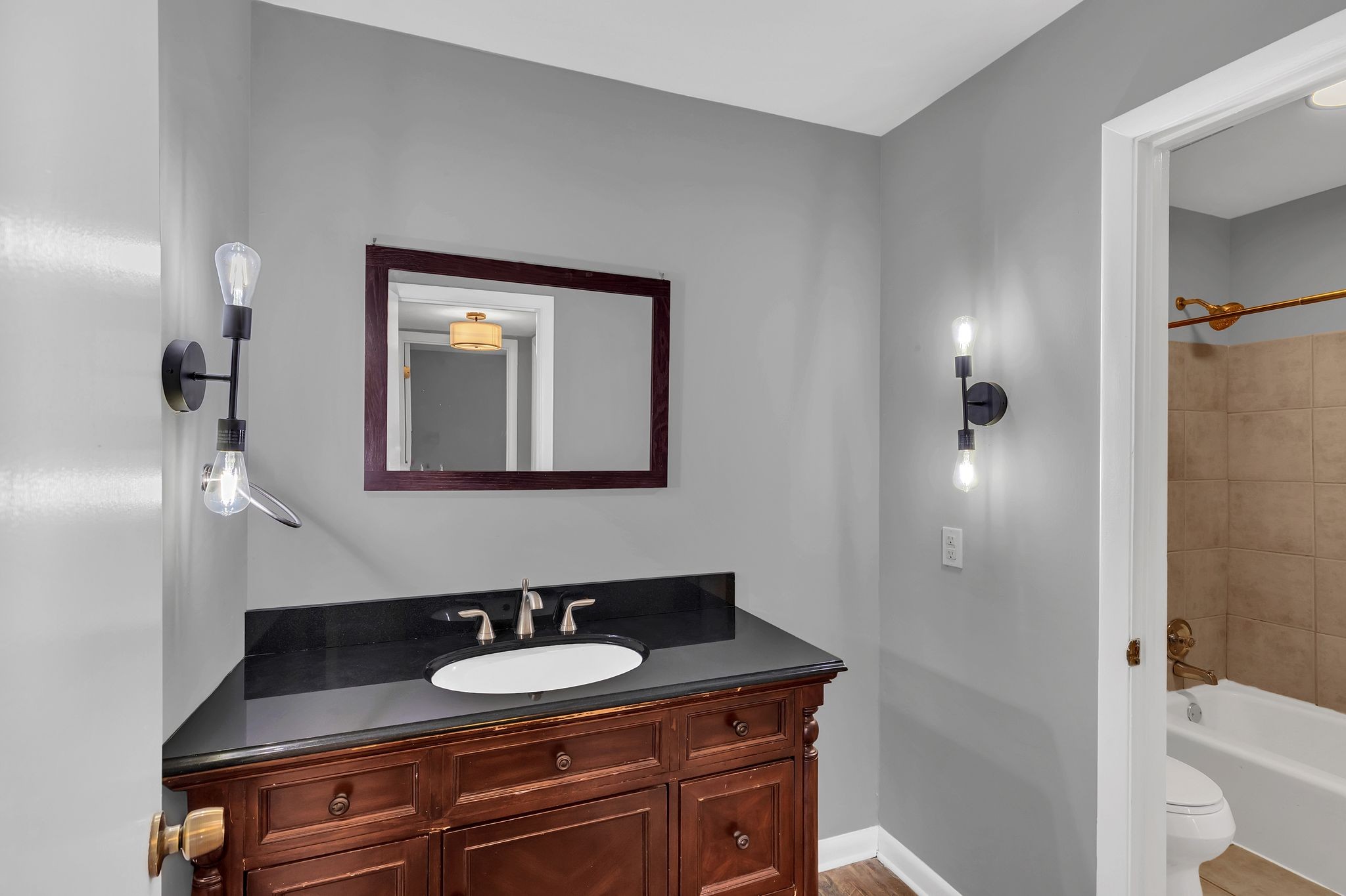 420 Walton Lane, Unit I41 Madison, TN 37115 - Photo 14 of 20 a bathroom with a sink and a mirror