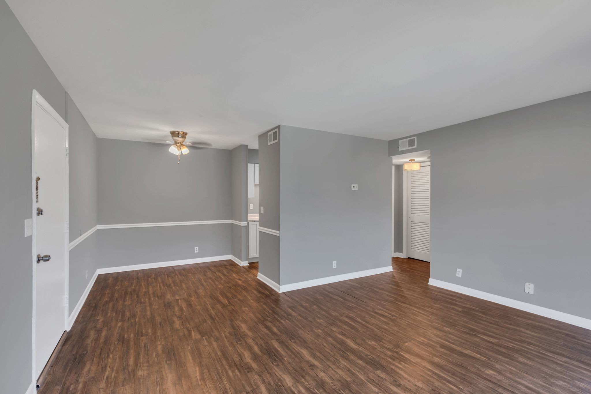 420 Walton Lane, Unit I41 Madison, TN 37115 - Photo 3 of 20 a view of empty room with wooden floor