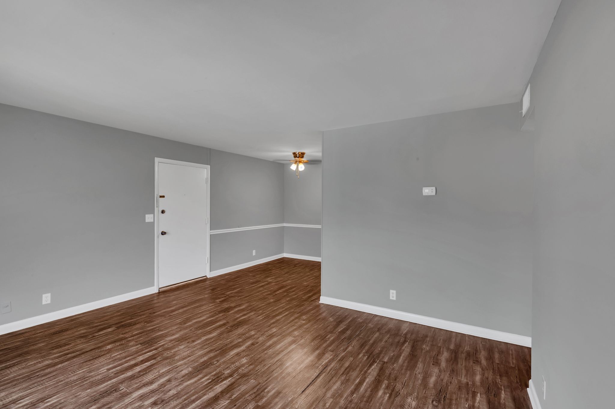 420 Walton Lane, Unit I41 Madison, TN 37115 - Photo 5 of 20 a view of empty room with wooden floor