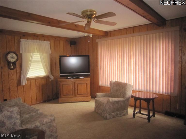 6220 South Raccoon Road Canfield, OH 44406 - Photo 8 of 13 View of 18' x 12' family room with large picture window and a view of backyard of this 1.52 acre property.