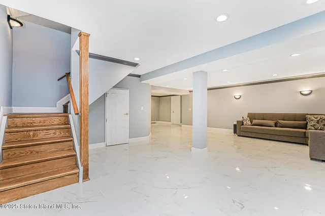 a view of a house with a patio and wooden floor
