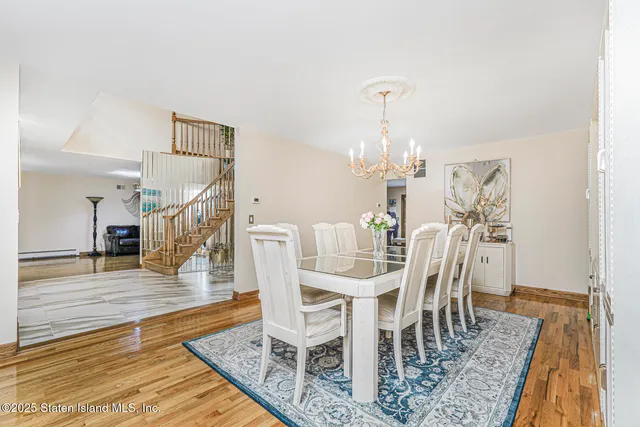 a view of a dining room with furniture