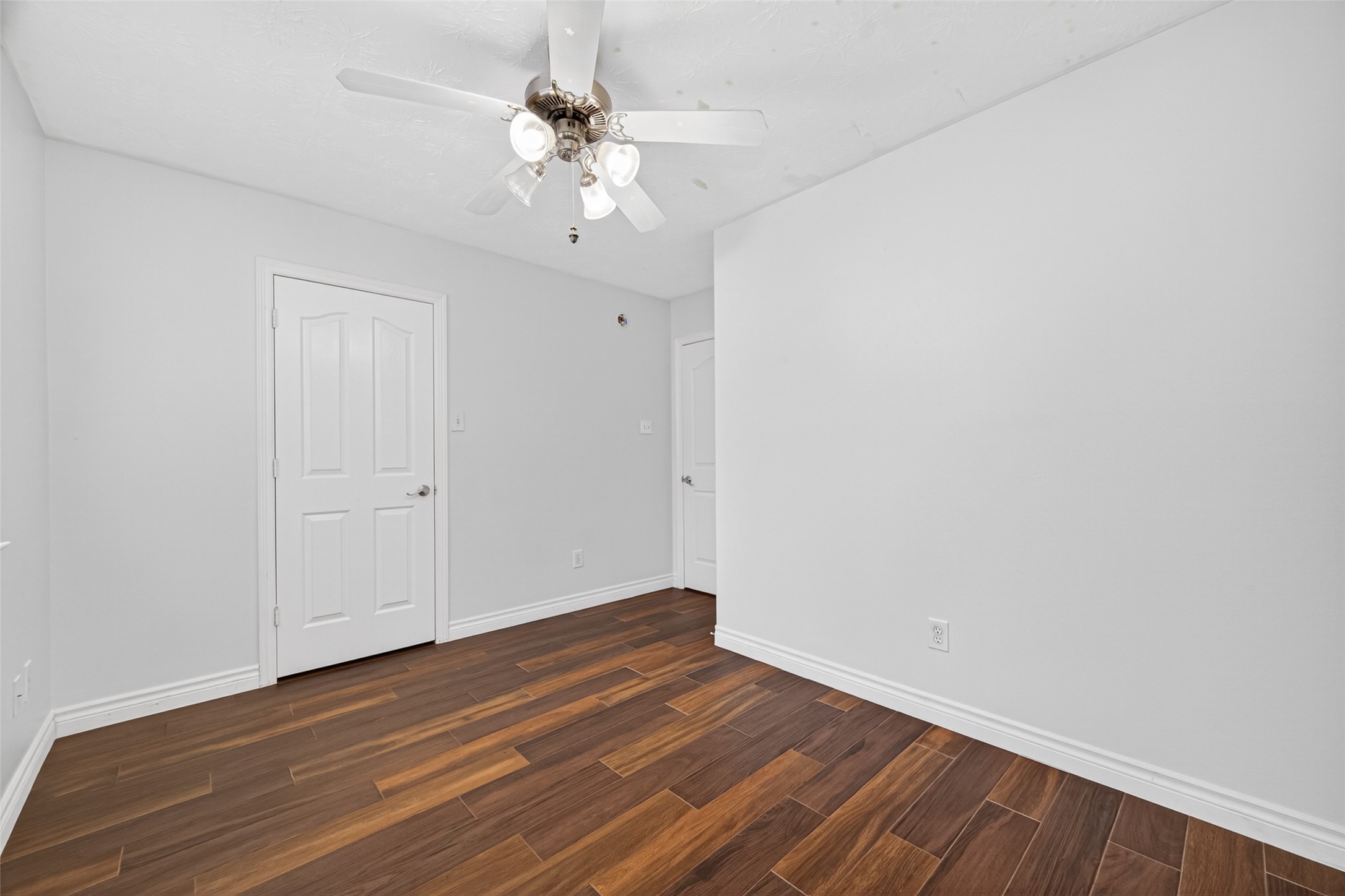 23914 Glengate Drive Spring, TX 77373 - Photo 30 of 49 a view of a room with wooden floor and chandelier