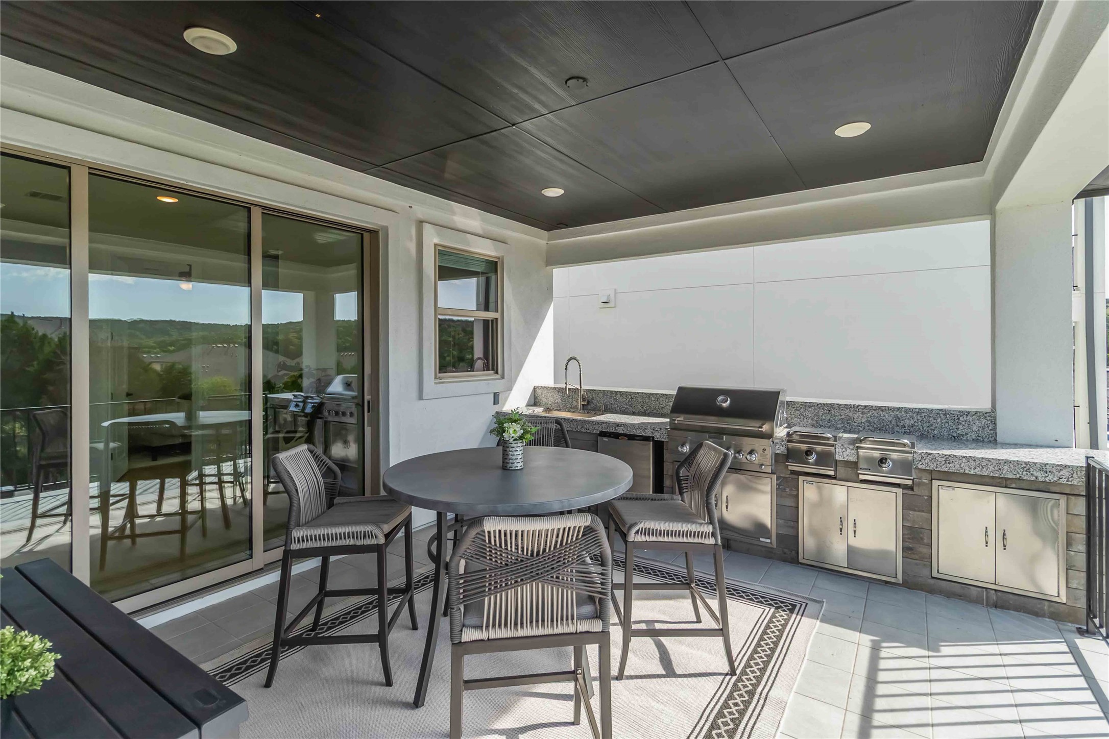 4705 Modena Bay Bend Leander, TX 78641 - Photo 33 of 40 View of patio / terrace featuring area for grilling and a sink