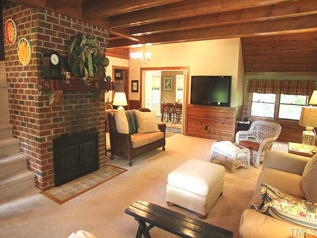 1314 Bill Poole Road Rougemont, NC 27572 - Photo 2 of 22 Cozy family room with fireplace and exposed beams.... Four Seasons Room