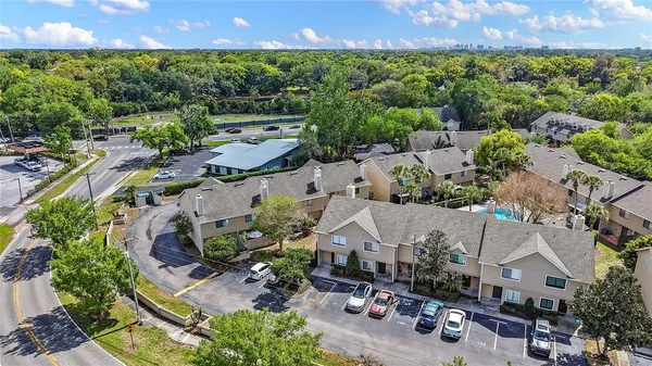 an aerial view of a house with a garden