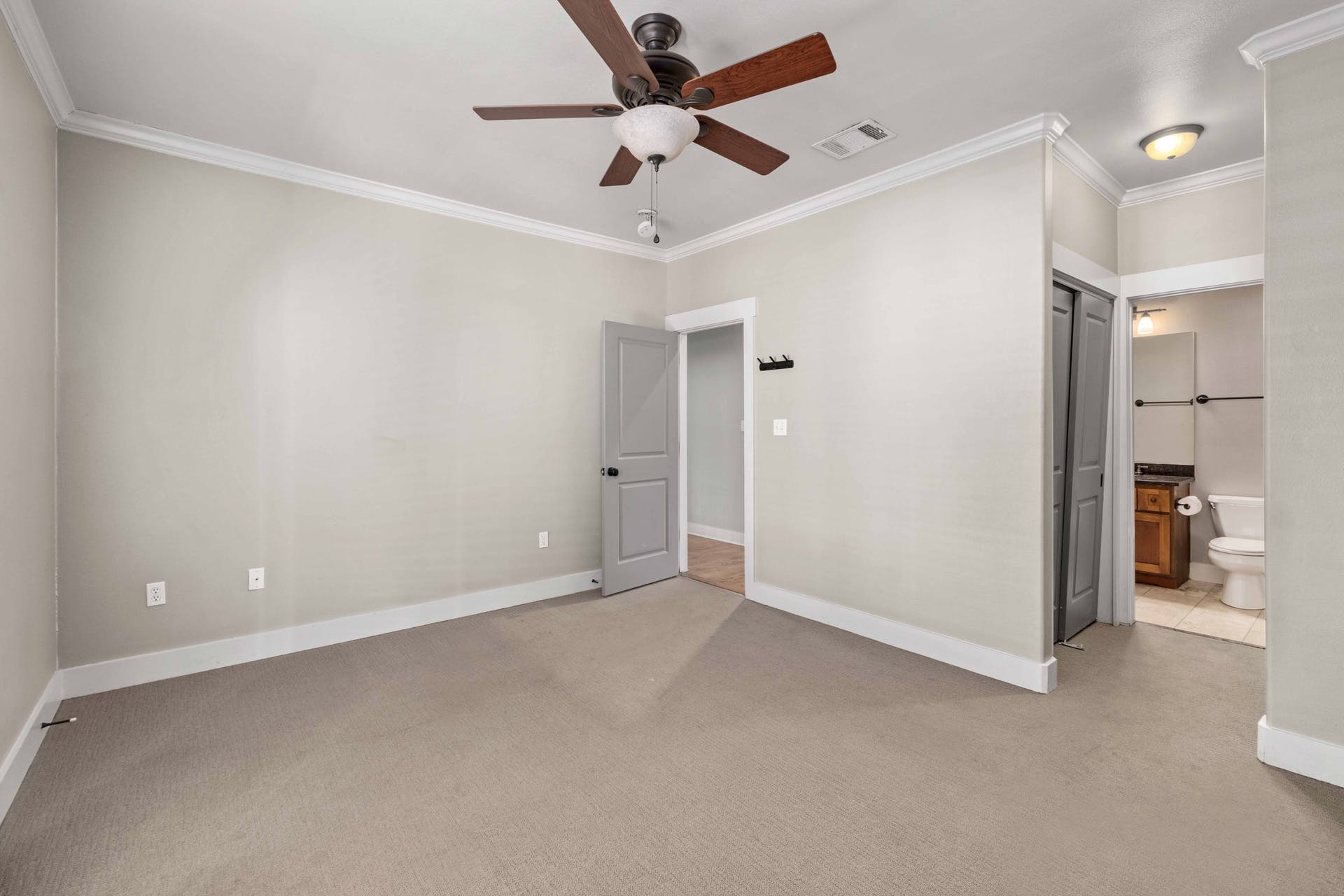 2309 A Longview Street, Unit A Austin, TX 78705 - Photo 11 of 13 wooden floor in an empty room