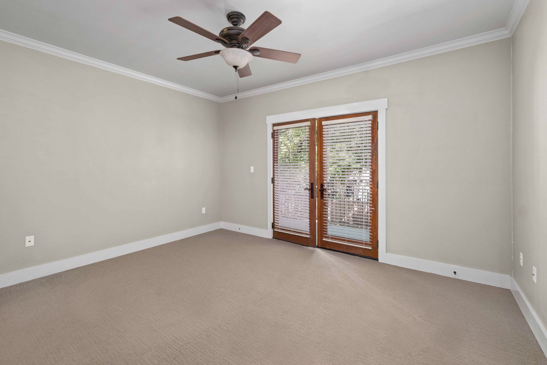 2309 A Longview Street, Unit A Austin, TX 78705 - Photo 12 of 13 an empty room with chandelier fan and windows