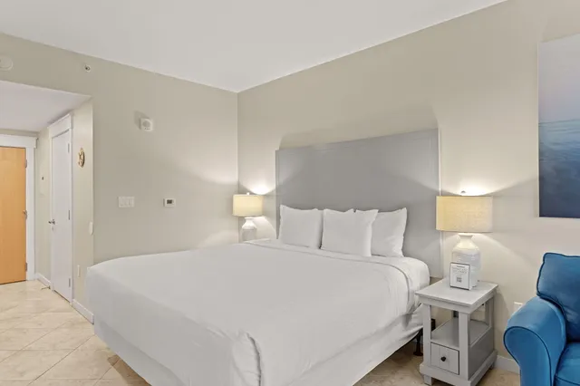 a view of a swimming pool with outdoor seating