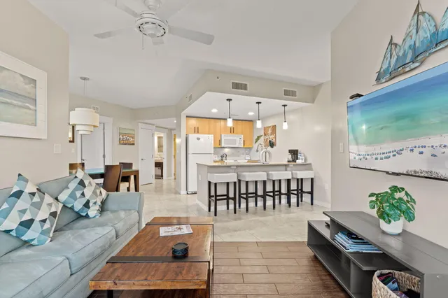 a living room with furniture and a table