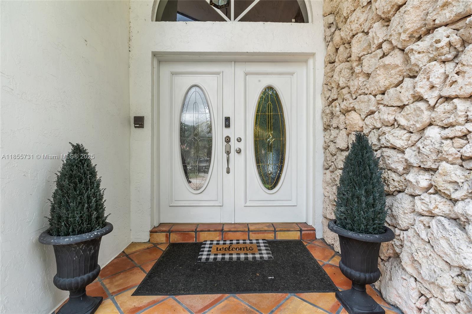 10723 Southwest 142nd Court Miami, FL 33186 - Photo 14 of 54 a view of a door with fountain