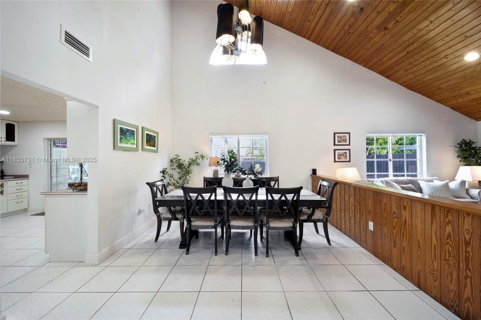 10723 Southwest 142nd Court Miami, FL 33186 - Photo 23 of 54 a dining room with furniture and window