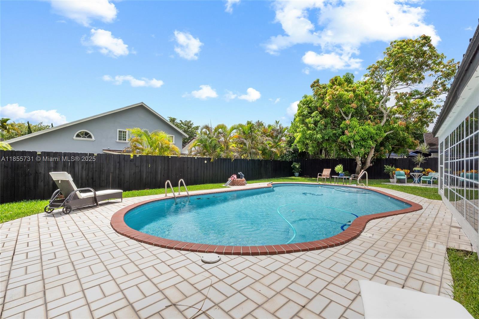 10723 Southwest 142nd Court Miami, FL 33186 - Photo 33 of 54 a view of outdoor space yard and swimming pool
