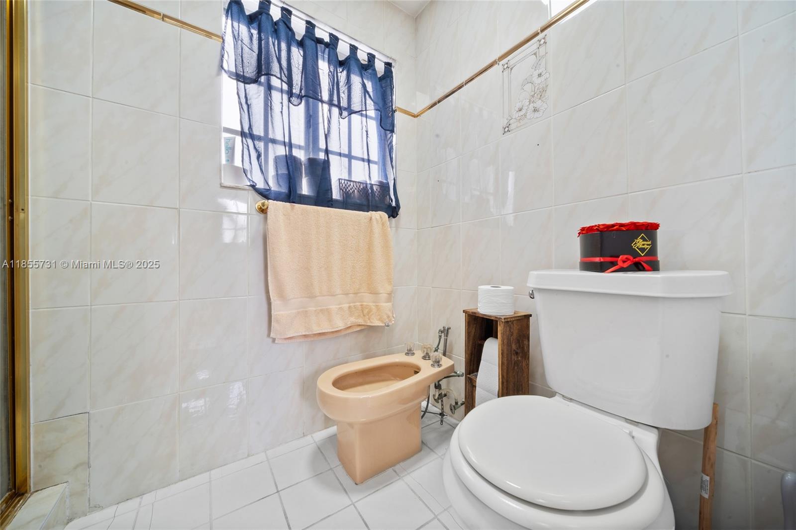 10723 Southwest 142nd Court Miami, FL 33186 - Photo 47 of 54 a white toilet sitting next to a bathroom sink