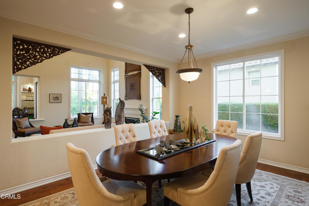 3921 Chapman Court Altadena, CA 91001 - Photo 14 of 64 a dining room with furniture a chandelier and wooden floor