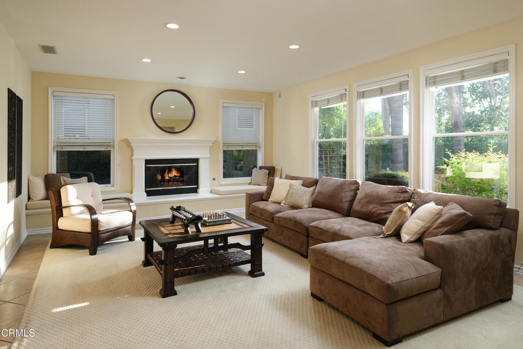 3921 Chapman Court Altadena, CA 91001 - Photo 17 of 64 a living room with furniture fireplace and a large window