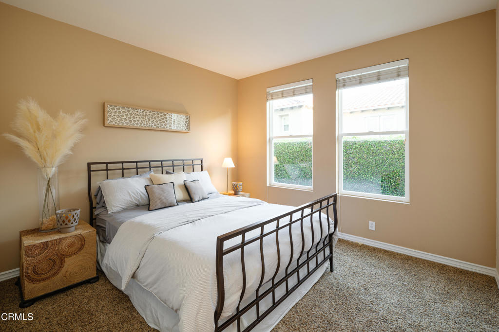 3921 Chapman Court Altadena, CA 91001 - Photo 25 of 64 a bedroom with a bed and a window