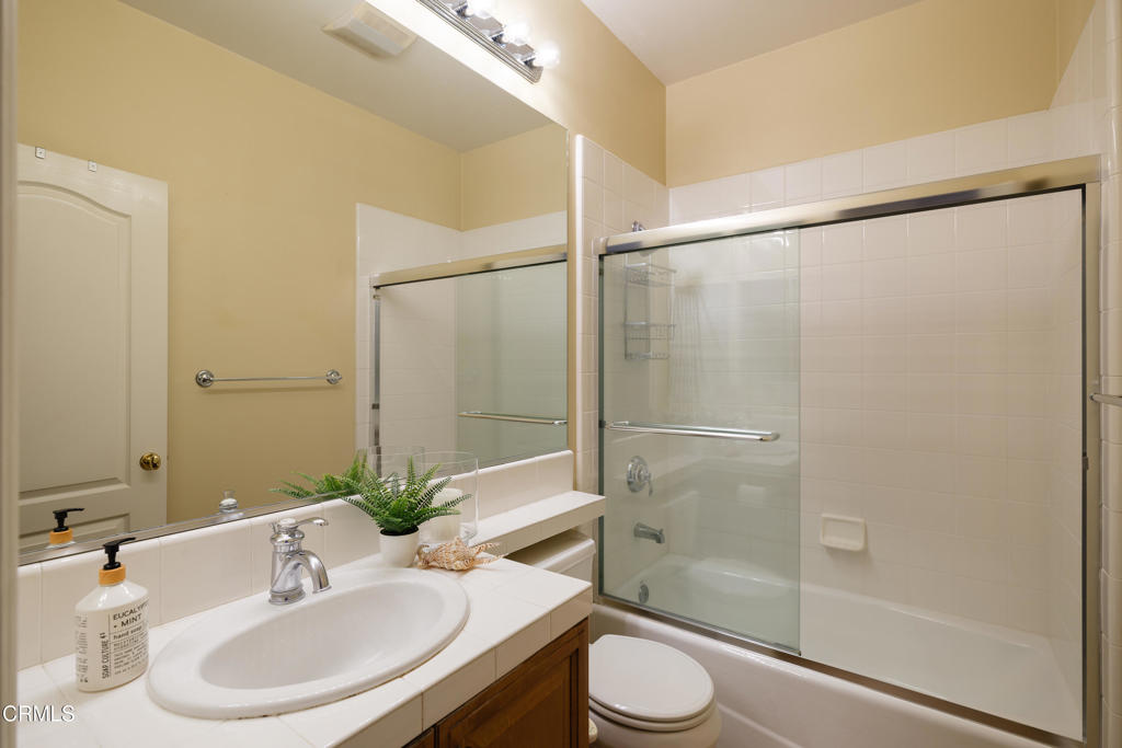 3921 Chapman Court Altadena, CA 91001 - Photo 26 of 64 a bathroom with a sink and a mirror