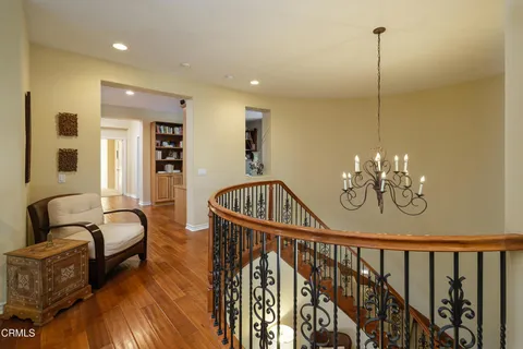 a view of a hallway view with staircase