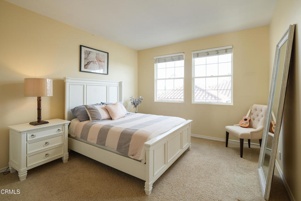 3921 Chapman Court Altadena, CA 91001 - Photo 34 of 64 a bedroom with a bed and a couch