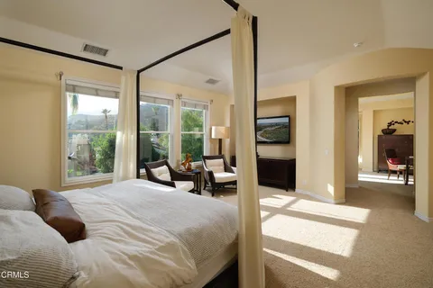 a backyard of a house with yard barbeque oven and outdoor seating