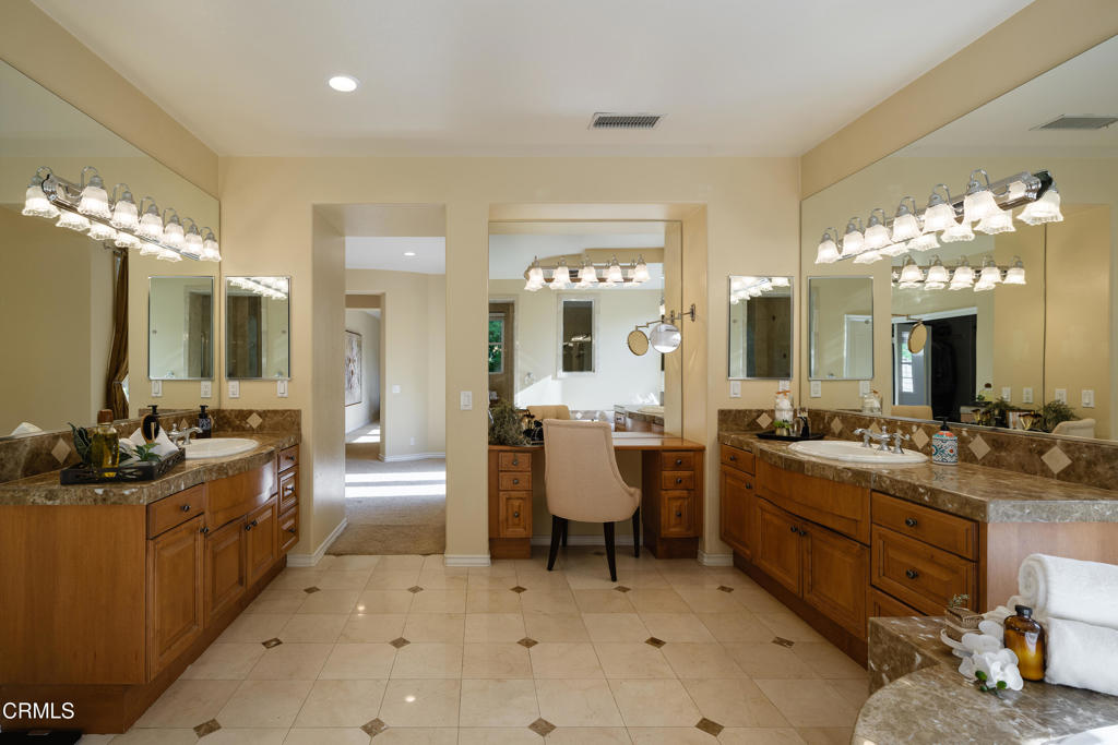 3921 Chapman Court Altadena, CA 91001 - Photo 44 of 64 a large bathroom with a sink a large mirror and a shower