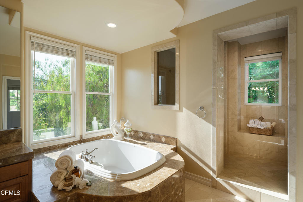 3921 Chapman Court Altadena, CA 91001 - Photo 46 of 64 a bath tub sitting in a bathroom next to a window