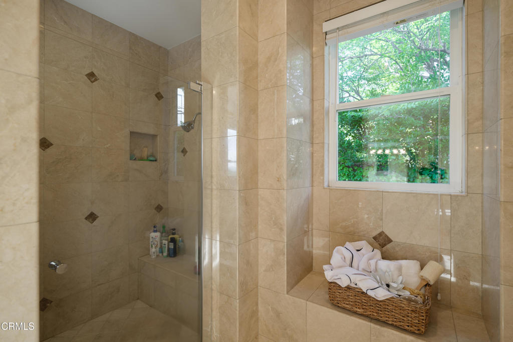 3921 Chapman Court Altadena, CA 91001 - Photo 47 of 64 a bathroom with a window and shower