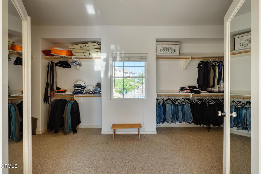 3921 Chapman Court Altadena, CA 91001 - Photo 48 of 64 a view of walk in closet with clothes and shoes
