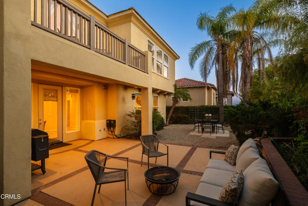 3921 Chapman Court Altadena, CA 91001 - Photo 54 of 64 a view of a patio with couches table and chairs and potted plants