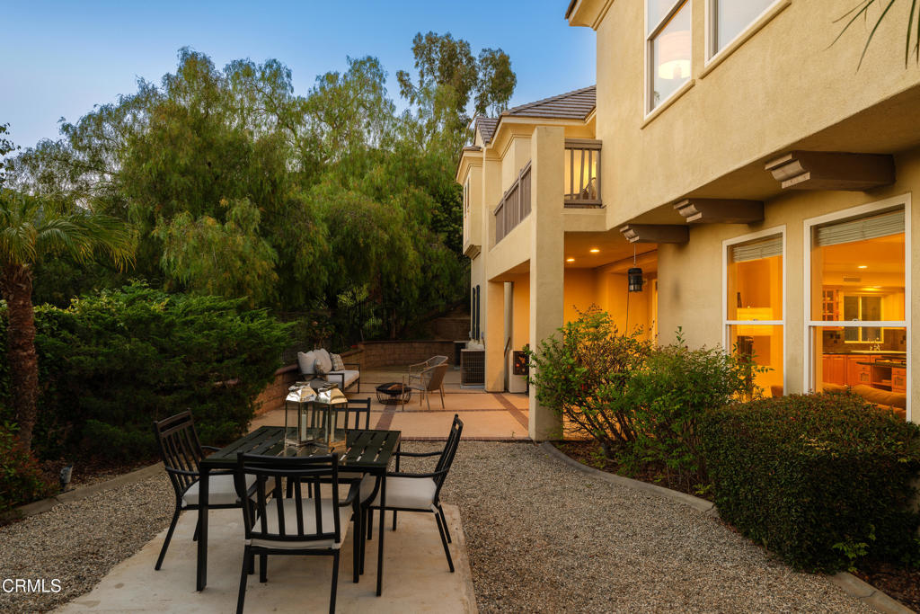 3921 Chapman Court Altadena, CA 91001 - Photo 57 of 64 a backyard of a house with table and chairs