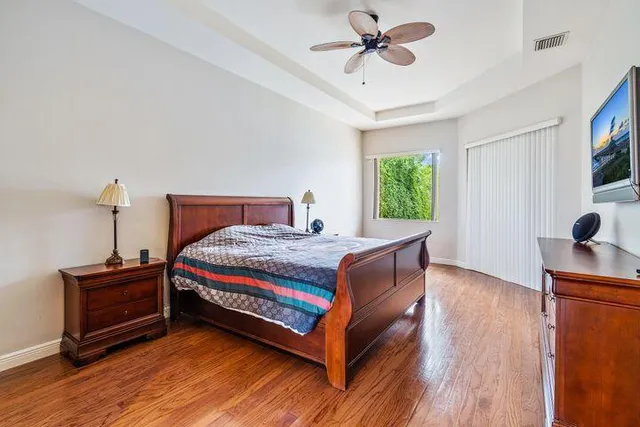 a bed room with a bed and a window