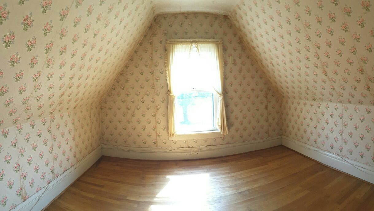 3730 Prairie Road Rockford, IL 61102 - Photo 7 of 12 a view of empty room with wooden floor and fan