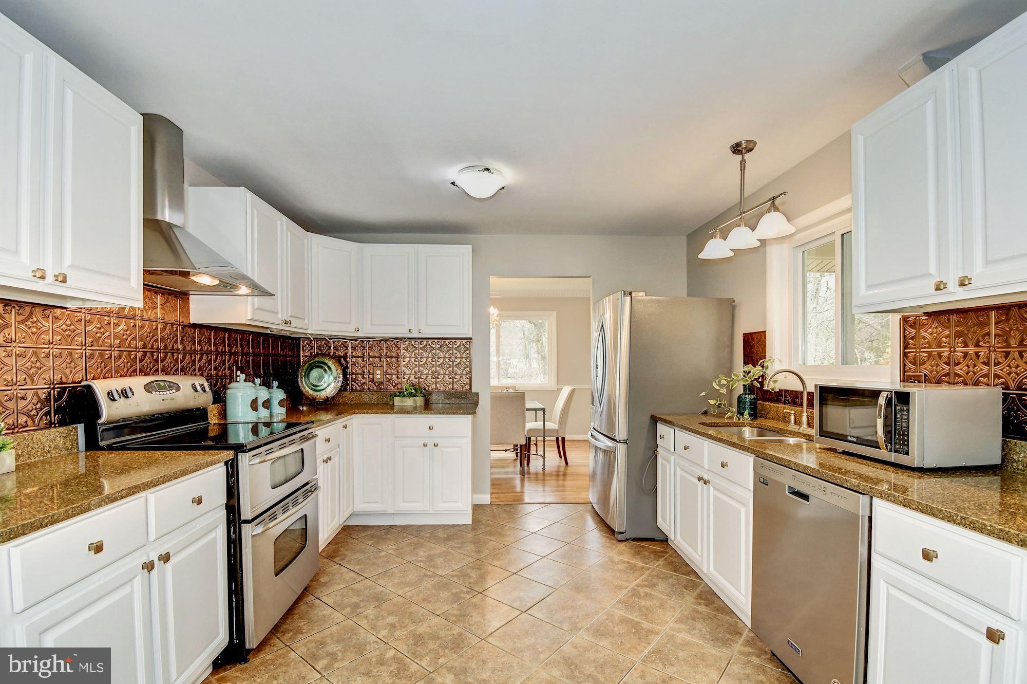 8721 Gateshead Road Alexandria, VA 22309 - Photo 13 of 48 Kitchen opens to dining room