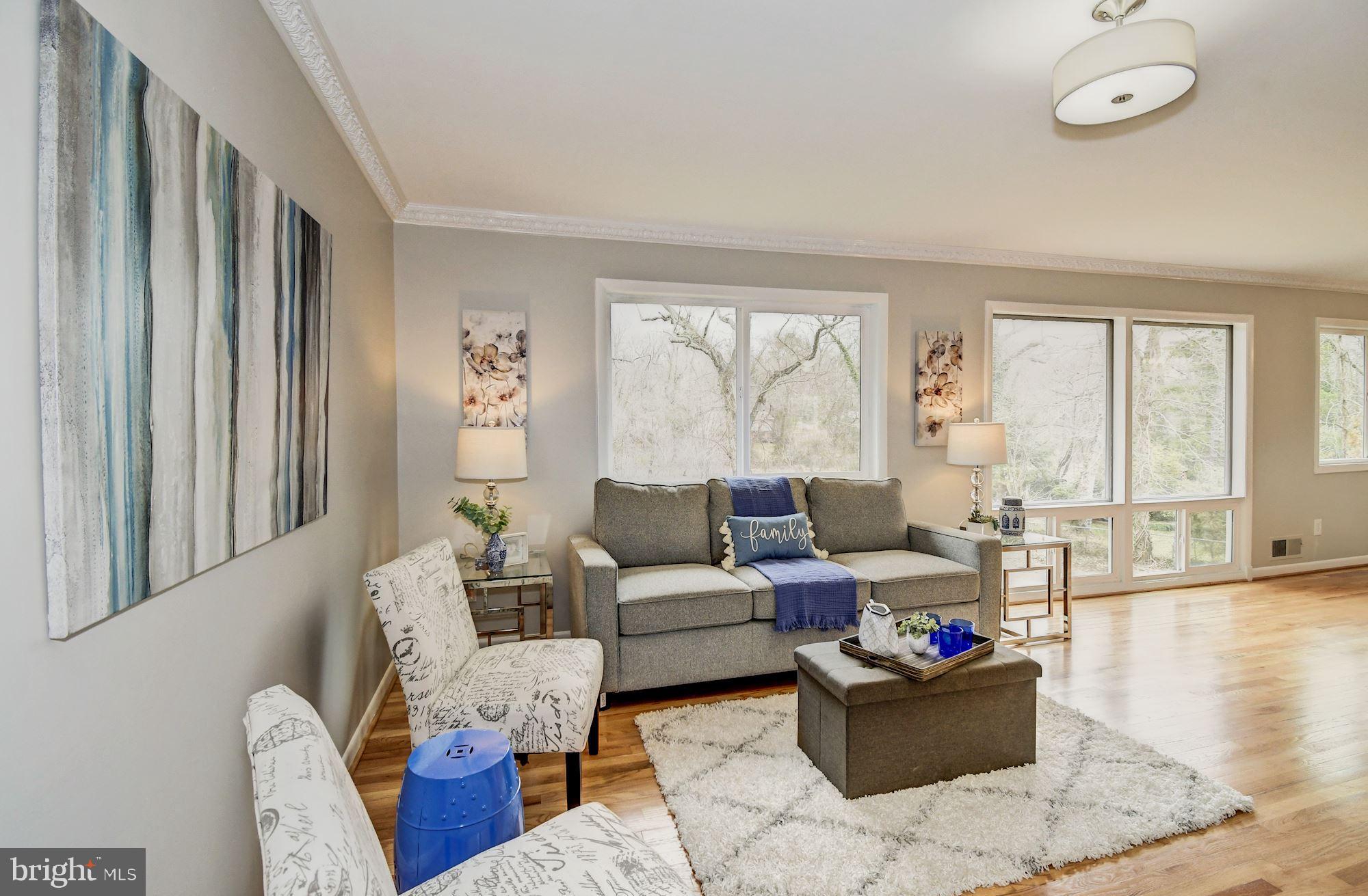8721 Gateshead Road Alexandria, VA 22309 - Photo 5 of 48 Living room with light and lots of windows