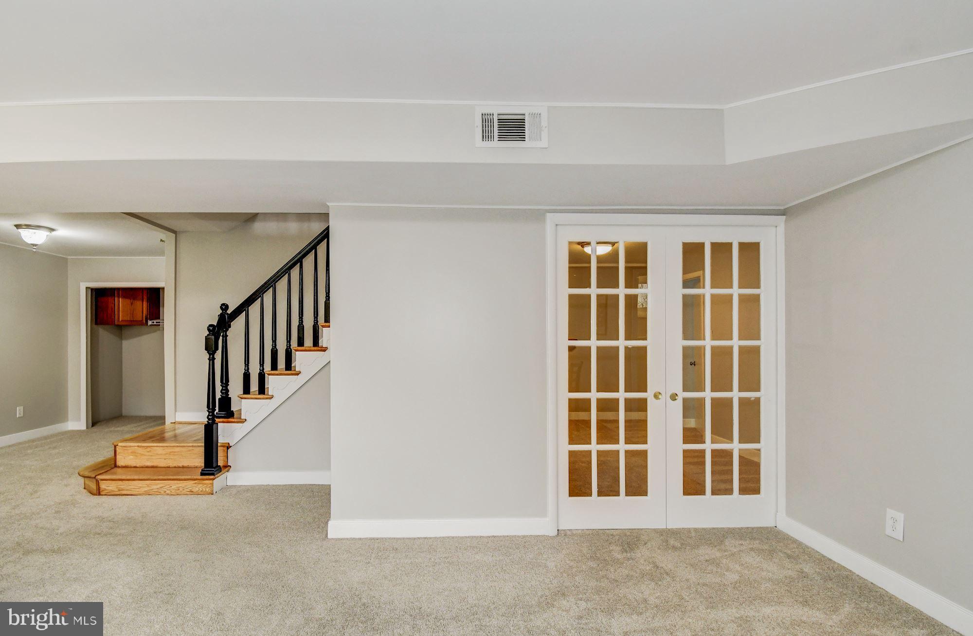 8721 Gateshead Road Alexandria, VA 22309 - Photo 43 of 48 French doors to bonus room