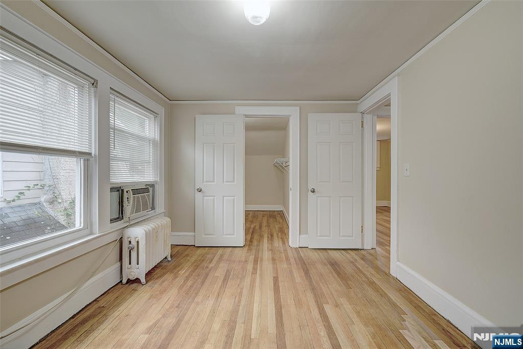 24 Brook Street Springfield, NJ 07081 - Photo 18 of 28 a view of a livingroom with wooden floor