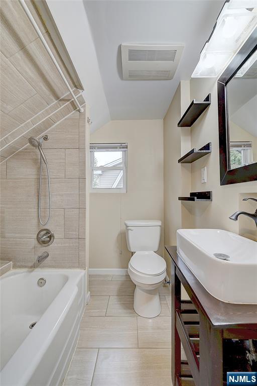 24 Brook Street Springfield, NJ 07081 - Photo 24 of 28 a bathroom with a sink a toilet and shower