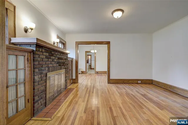 a view of a livingroom with wooden floor