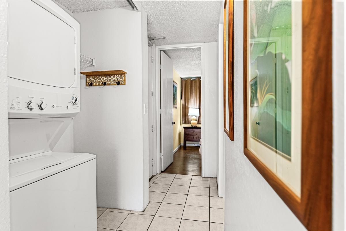 940 South Kihei Road, Unit B204 Kihei, HI 96753 - Photo 15 of 30 a view of a hallway with washer and dryer