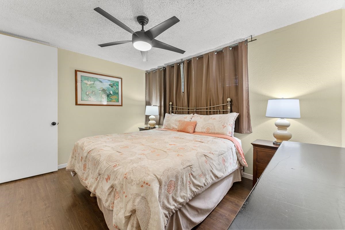 940 South Kihei Road, Unit B204 Kihei, HI 96753 - Photo 21 of 30 a bedroom with bed and window