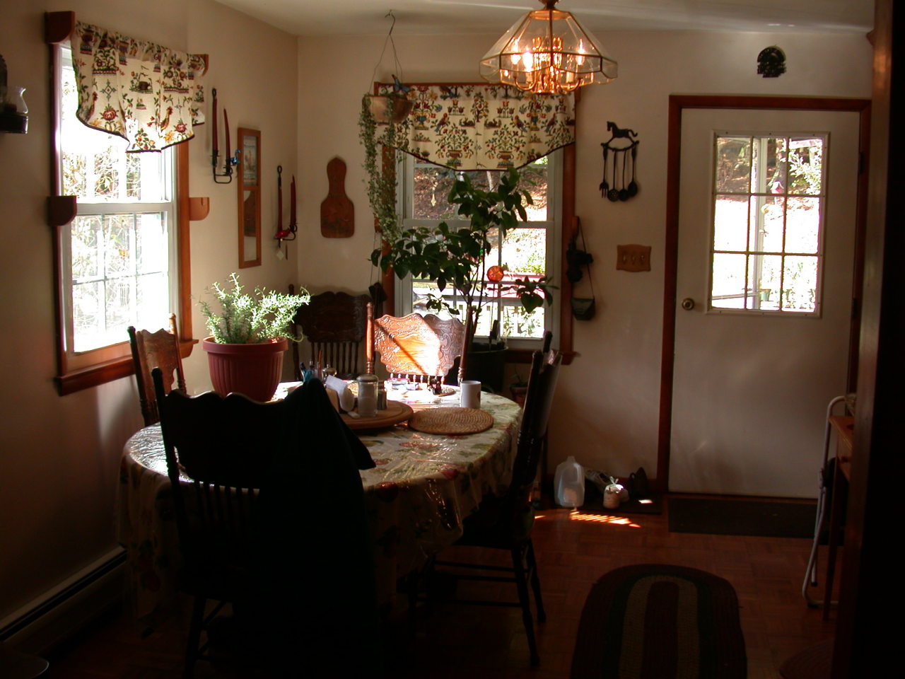 105 Gibbs Road Otis, MA 01253 - Photo 8 of 16 a living room with furniture and a chandelier