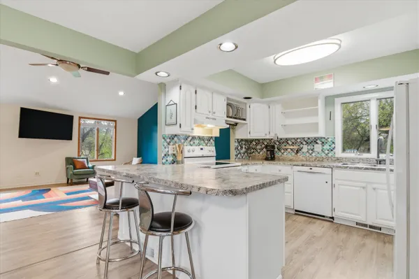 $409,900 | 9095 Huron River Drive, Brighton, MI 48116