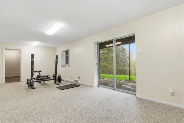 $409,900 | 9095 Huron River Drive, Brighton, MI 48116
